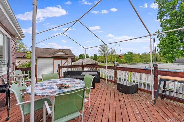 306 Hamilton St, Byron, MI 48418 - deck with outdoor dining space