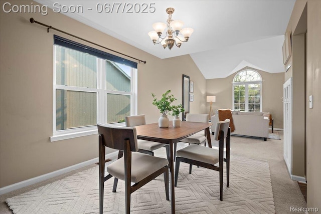 5602 Adderstone Dr, Clarkston, MI 48346 - dining area with a chandelier, light colored carpet, baseboards, and lofted ceiling