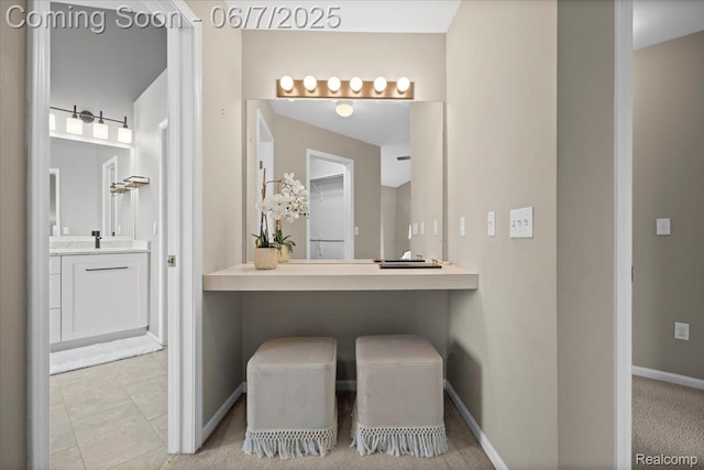 5602 Adderstone Dr, Clarkston, MI 48346 - bathroom with vanity, baseboards, and tile patterned floors