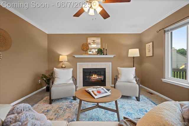 5602 Adderstone Dr, Clarkston, MI 48346 - carpeted living area with ceiling fan, baseboards, a tile fireplace, and crown molding