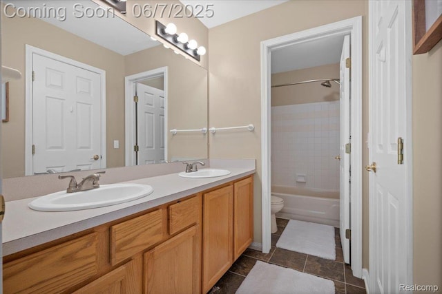 5602 Adderstone Dr, Clarkston, MI 48346 - full bath featuring double vanity, toilet, washtub / shower combination, and tile patterned flooring
