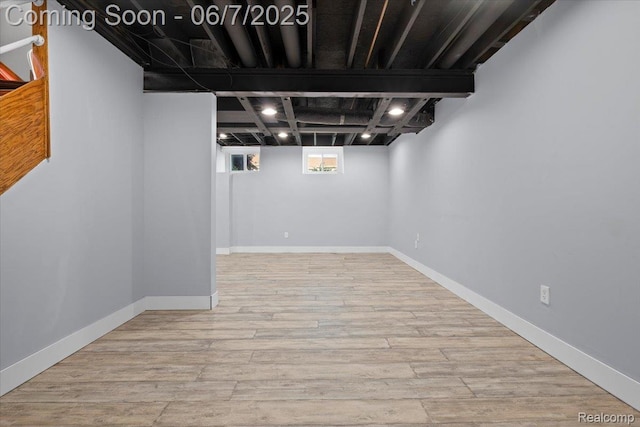 5602 Adderstone Dr, Clarkston, MI 48346 - basement with wood finished floors and recessed lighting