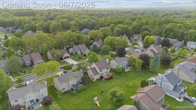5602 Adderstone Dr, Clarkston, MI 48346 - aerial perspective of suburban area with a forest