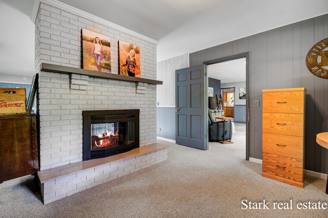 300 N 2nd Ave, Fruitport, MI 49415 - carpeted living room featuring a fireplace