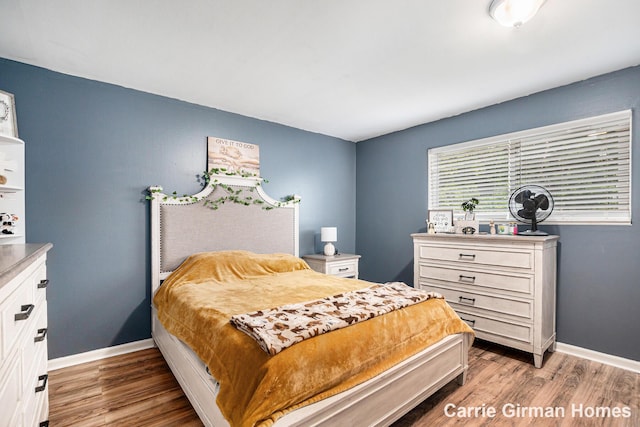 6716 Cascade Rd SE, Grand Rapids, MI 49546 - bedroom featuring wood finished floors and baseboards