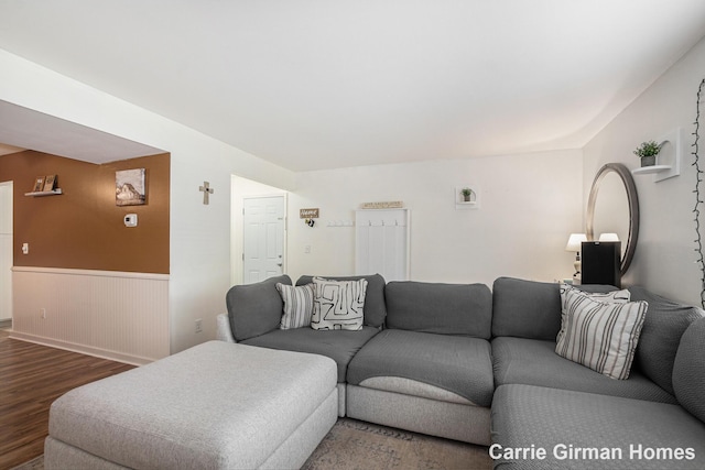 6716 Cascade Rd SE, Grand Rapids, MI 49546 - living area with wood finished floors and wainscoting