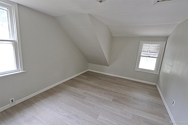19444 Inkster Rd, Redford, MI 48240 - bonus room with lofted ceiling, light wood-style flooring, and baseboards