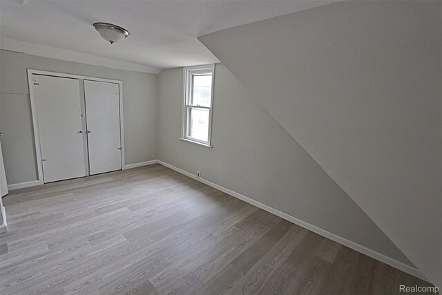 19444 Inkster Rd, Redford, MI 48240 - bonus room featuring light wood finished floors, lofted ceiling, and baseboards