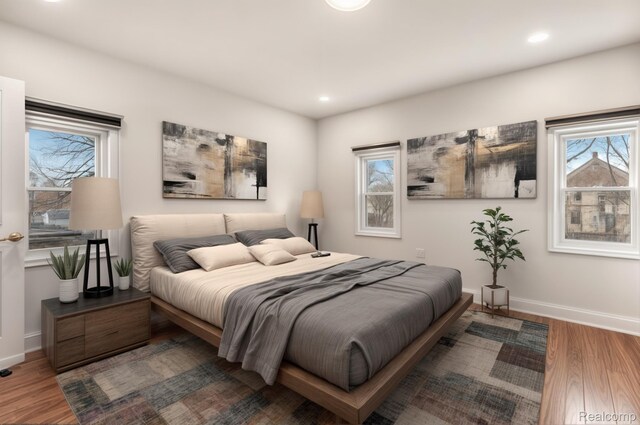 2547 Seyburn St, Detroit, MI 48214 - bedroom with baseboards, wood finished floors, and recessed lighting
