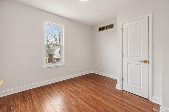 2547 Seyburn St, Detroit, MI 48214 - unfurnished room featuring wood finished floors and baseboards