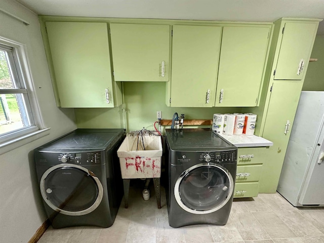 13405 S Gera Rd, Birch Run, MI 48415 - laundry room featuring cabinet space and separate washer and dryer