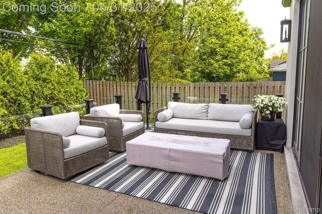 923 S Glenhurst Dr, Birmingham, MI 48009 - wooden terrace featuring an outdoor hangout area, a fenced backyard, and a patio