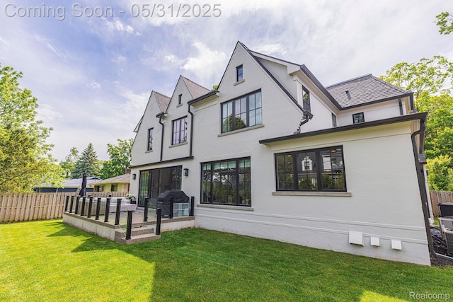 923 S Glenhurst Dr, Birmingham, MI 48009 - back of house featuring stucco siding and a patio area