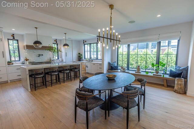 923 S Glenhurst Dr, Birmingham, MI 48009 - dining area with light wood-style flooring and recessed lighting