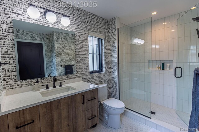 923 S Glenhurst Dr, Birmingham, MI 48009 - bathroom with toilet, vanity, a shower stall, and tile patterned flooring