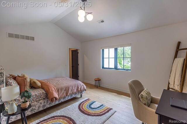 923 S Glenhurst Dr, Birmingham, MI 48009 - bedroom featuring lofted ceiling, light wood-style floors, and baseboards