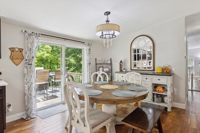 5885 Lammers Rd, Hastings, MI 49058 - dining area with light wood-type flooring and baseboards