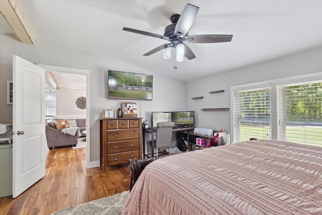 5885 Lammers Rd, Hastings, MI 49058 - bedroom featuring lofted ceiling, wood finished floors, and a ceiling fan