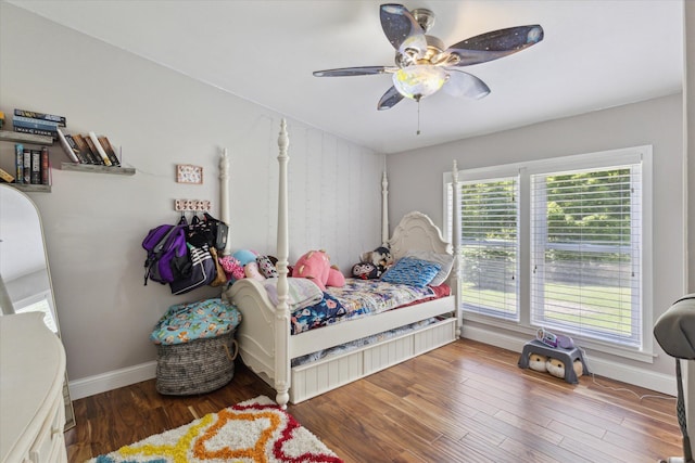 5885 Lammers Rd, Hastings, MI 49058 - bedroom featuring baseboards, wood finished floors, and ceiling fan