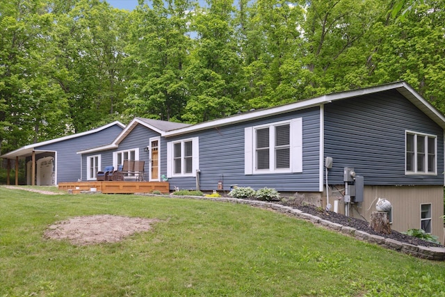 5885 Lammers Rd, Hastings, MI 49058 - view of front facade featuring a wooden deck and a front lawn