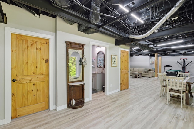 5885 Lammers Rd, Hastings, MI 49058 - basement featuring wood finished floors and baseboards