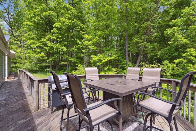 5885 Lammers Rd, Hastings, MI 49058 - deck featuring outdoor dining area and area for grilling