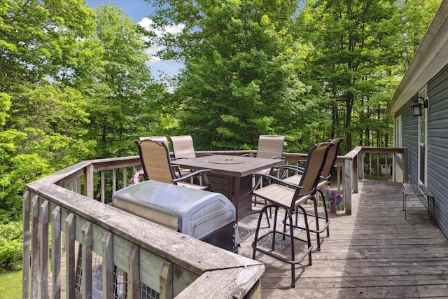 5885 Lammers Rd, Hastings, MI 49058 - wooden terrace featuring outdoor dining space