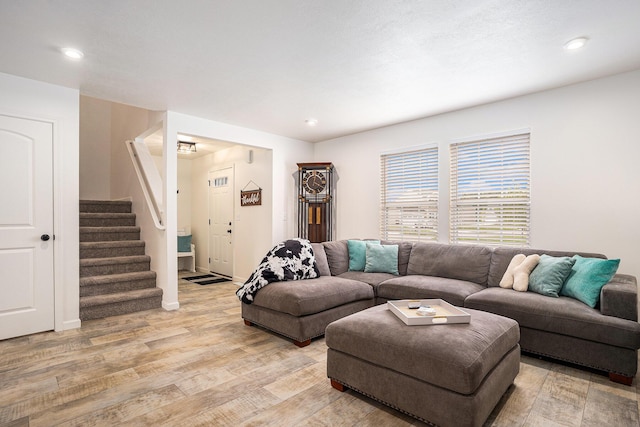 10900 Vine Leaf Cir, Allendale, MI 49401 - living area featuring stairway, light wood finished floors, and recessed lighting