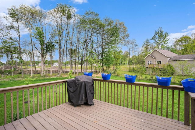 10900 Vine Leaf Cir, Allendale, MI 49401 - deck with a lawn and a grill