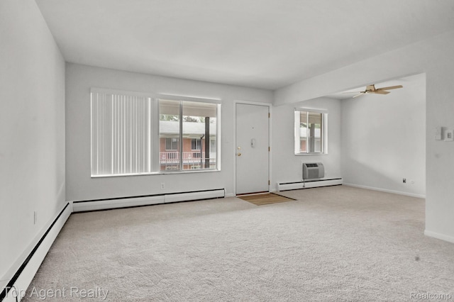 2125 Clawson Ave Unit 207, Royal Oak, MI 48073 - unfurnished room featuring a baseboard radiator, plenty of natural light, and carpet floors