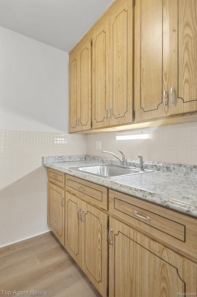 2125 Clawson Ave Unit 207, Royal Oak, MI 48073 - kitchen with a sink, light wood-type flooring, and light countertops