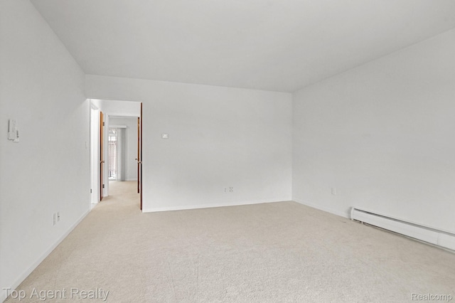 2125 Clawson Ave Unit 207, Royal Oak, MI 48073 - unfurnished room with light carpet, baseboards, and baseboard heating