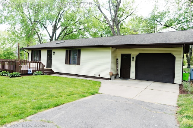 4447 Stanley Rd, Genesee, MI 48437 - ranch-style home featuring an attached garage, driveway, a front lawn, a deck, and a shingled roof