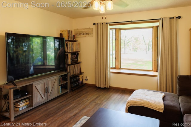 4447 Stanley Rd, Genesee, MI 48437 - living area featuring wood finished floors, baseboards, and a ceiling fan