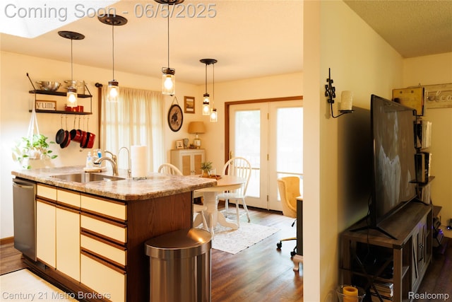 4447 Stanley Rd, Genesee, MI 48437 - kitchen with a sink, dark wood-style floors, hanging light fixtures, and stainless steel dishwasher