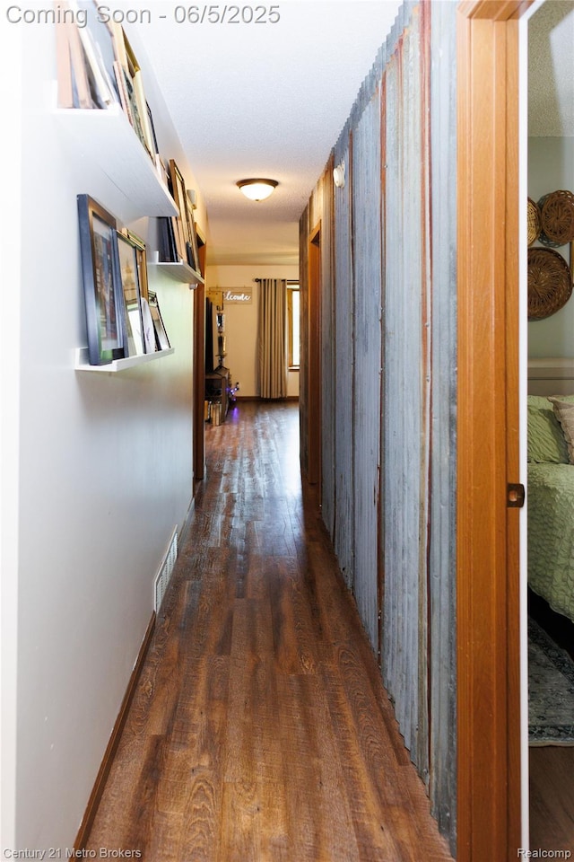 4447 Stanley Rd, Genesee, MI 48437 - corridor featuring dark wood-style flooring