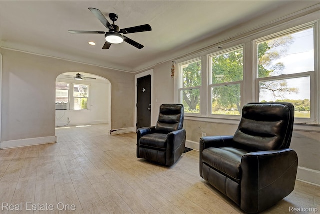 86 Marquette St, Pontiac, MI 48342 - sitting room featuring arched walkways, a ceiling fan, baseboards, light wood-type flooring, and recessed lighting