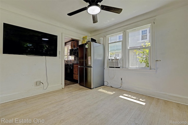 86 Marquette St, Pontiac, MI 48342 - spare room with light wood-style flooring, a ceiling fan, baseboards, and cooling unit