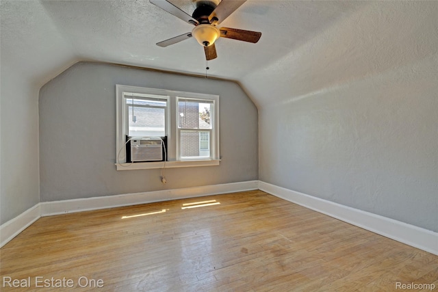 86 Marquette St, Pontiac, MI 48342 - bonus room with lofted ceiling, cooling unit, a textured ceiling, wood finished floors, and a ceiling fan