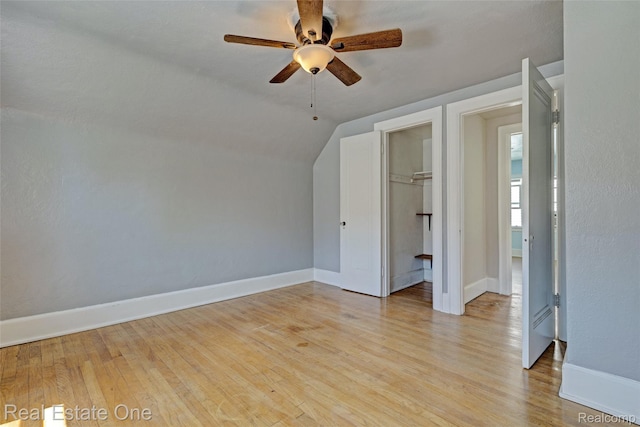 86 Marquette St, Pontiac, MI 48342 - unfurnished bedroom with light wood-type flooring, baseboards, lofted ceiling, a closet, and a ceiling fan