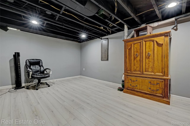 86 Marquette St, Pontiac, MI 48342 - finished below grade area with light wood-type flooring and baseboards