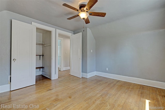 86 Marquette St, Pontiac, MI 48342 - unfurnished bedroom with light wood-type flooring, baseboards, vaulted ceiling, a ceiling fan, and a closet