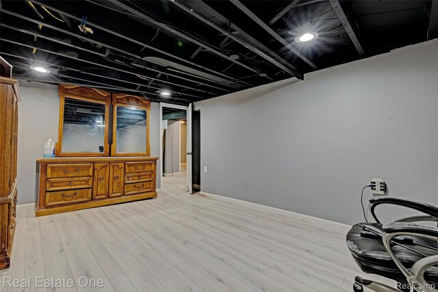 86 Marquette St, Pontiac, MI 48342 - finished below grade area featuring light wood-style floors and baseboards