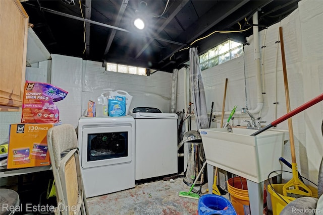86 Marquette St, Pontiac, MI 48342 - laundry area with washer and clothes dryer and plenty of natural light
