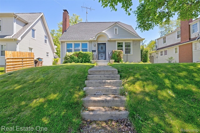 86 Marquette St, Pontiac, MI 48342 - bungalow-style home with a chimney