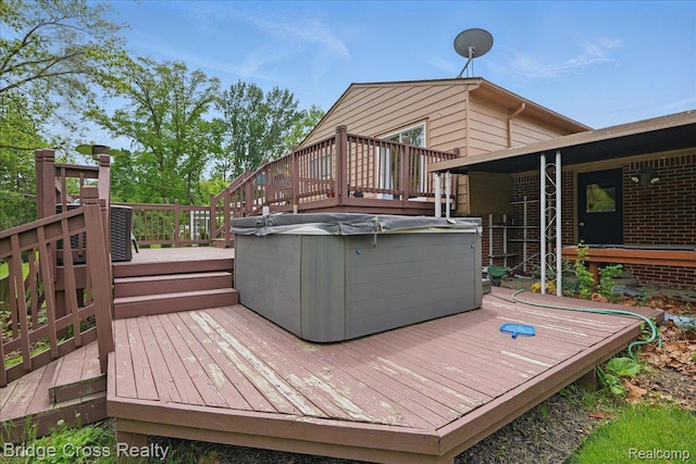 23850 Barfield St, Farmington, MI 48336 - wooden deck with a hot tub