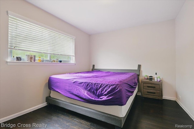 23850 Barfield St, Farmington, MI 48336 - bedroom featuring wood finished floors and baseboards