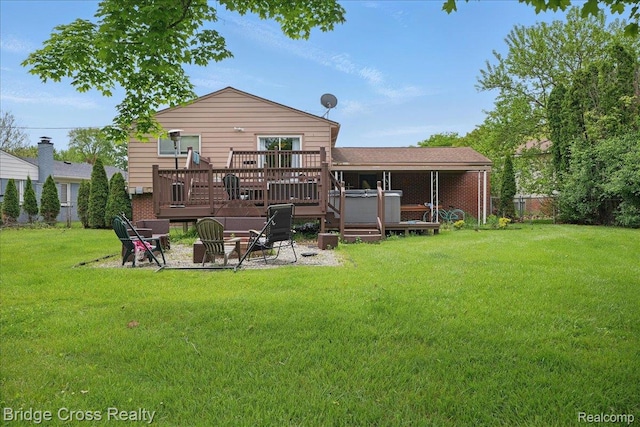 23850 Barfield St, Farmington, MI 48336 - back of house with a hot tub and a deck