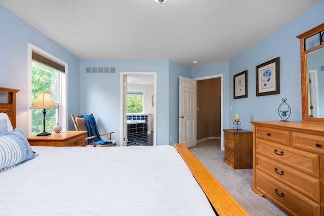 4388 Lori Lynn Ln, Whitmore Lake, MI 48189 - bedroom with baseboards and ensuite bathroom