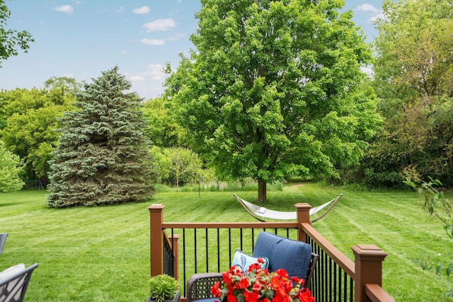 4388 Lori Lynn Ln, Whitmore Lake, MI 48189 - view of grassy yard featuring a wooden deck